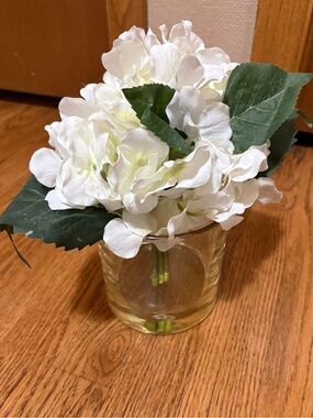 Pottery Barn composed faux white florals in glass vase